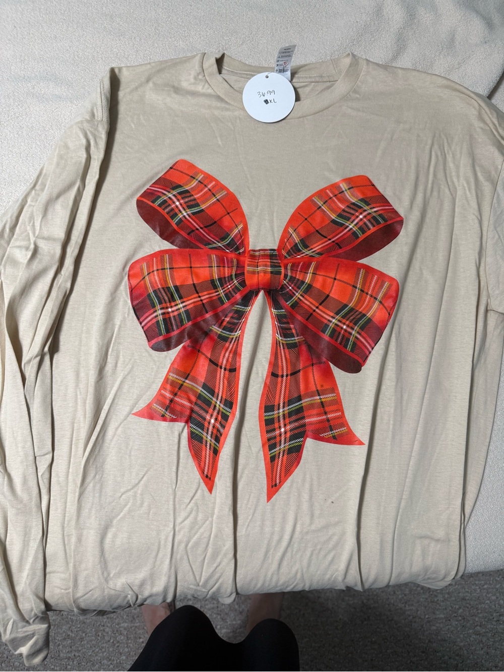 Cream Long-Sleeve Tee with Red Plaid Bow Graphic